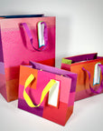 Bolsa de Regalo L - Geométrico Rosado (con Folia Met.)